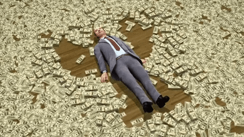 man lying on the floor with money